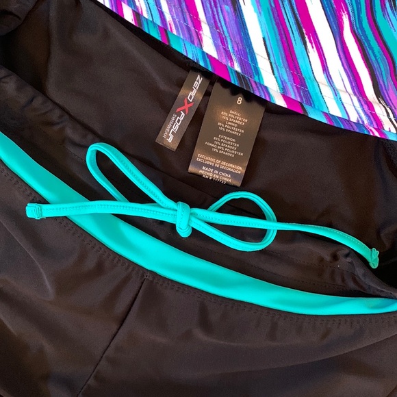 NWT - Zeroxposur Tankini/Shorts
2pc Bathing Swim Suit
Black/Purple/Aqua (Size 8) - Picture 4 of 6